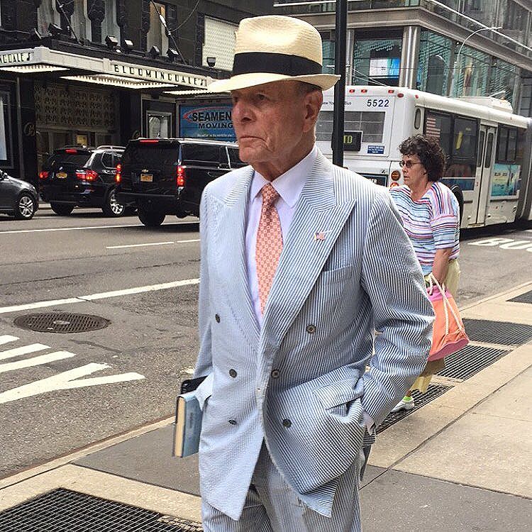 There's something so cool about being buttoned up but being undone at the very same time. This fella for example has just the anchor button done. So he appears fastened and not flapping in the wind yet from the exterior one might think he's unbuttoned.