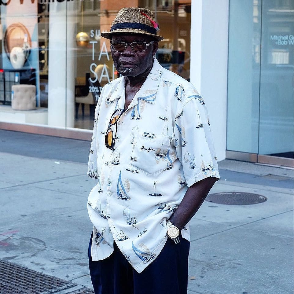 Generous fitting short-sleeved summer shirts are whats up fellas. Dont get caught up all slim-flitting rolling up the lil cuff. Wish you could see his full pleated blue trousers. Watch worn as bracelet!