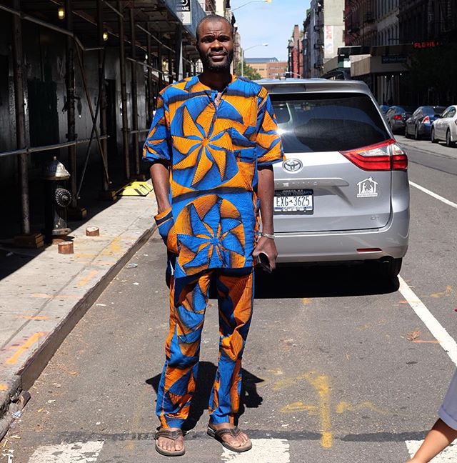 It wasnt easy explaining to this gentleman why i wanted to photograph him. I had to walk 2-3 blocks with him running actually. While looking in my camera for other people in batik that i knew I had shot earlier in day. He eventually obliged. I love the people I photograph!