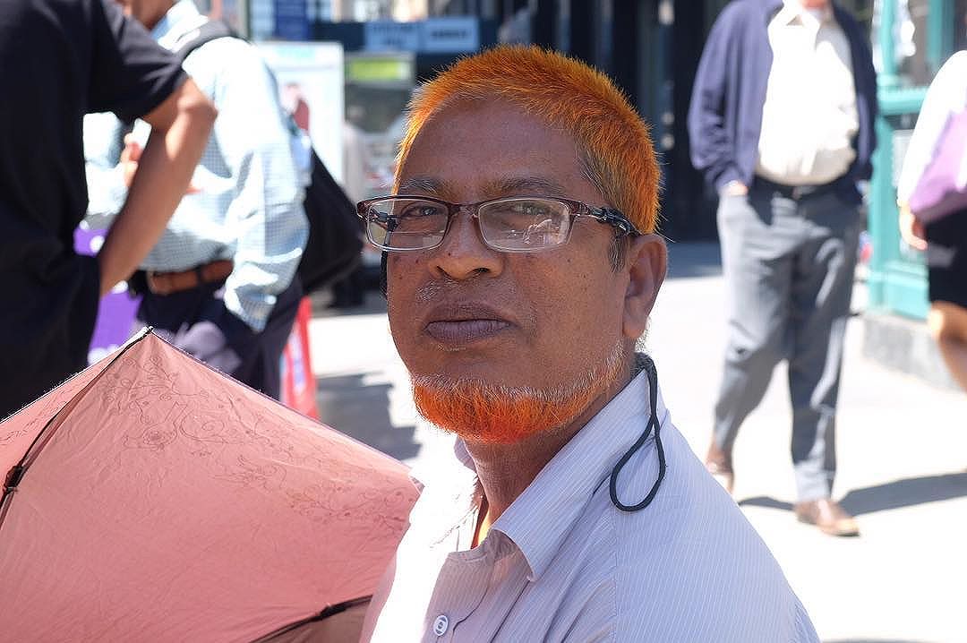 I've always wondered why men from certain places dye their beard/hair orange and this fella from Bangladesh told me it's a sign of doing well. I did some googling and they're not allowed to use dye that isn't henna) So very cool. He also said it makes people happy! I did read once that looking at orange is supposed to make you happy. Man, I'd be checking myself out all day! I'd be the happiest camper!