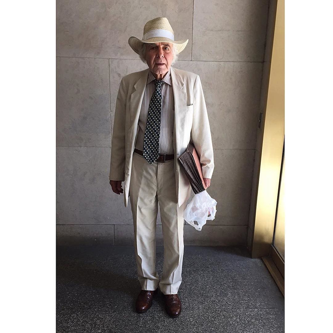 A fella wears a linen or silk suit with a straw hat outta function. Not trying to look cool but rather feel cool when working.