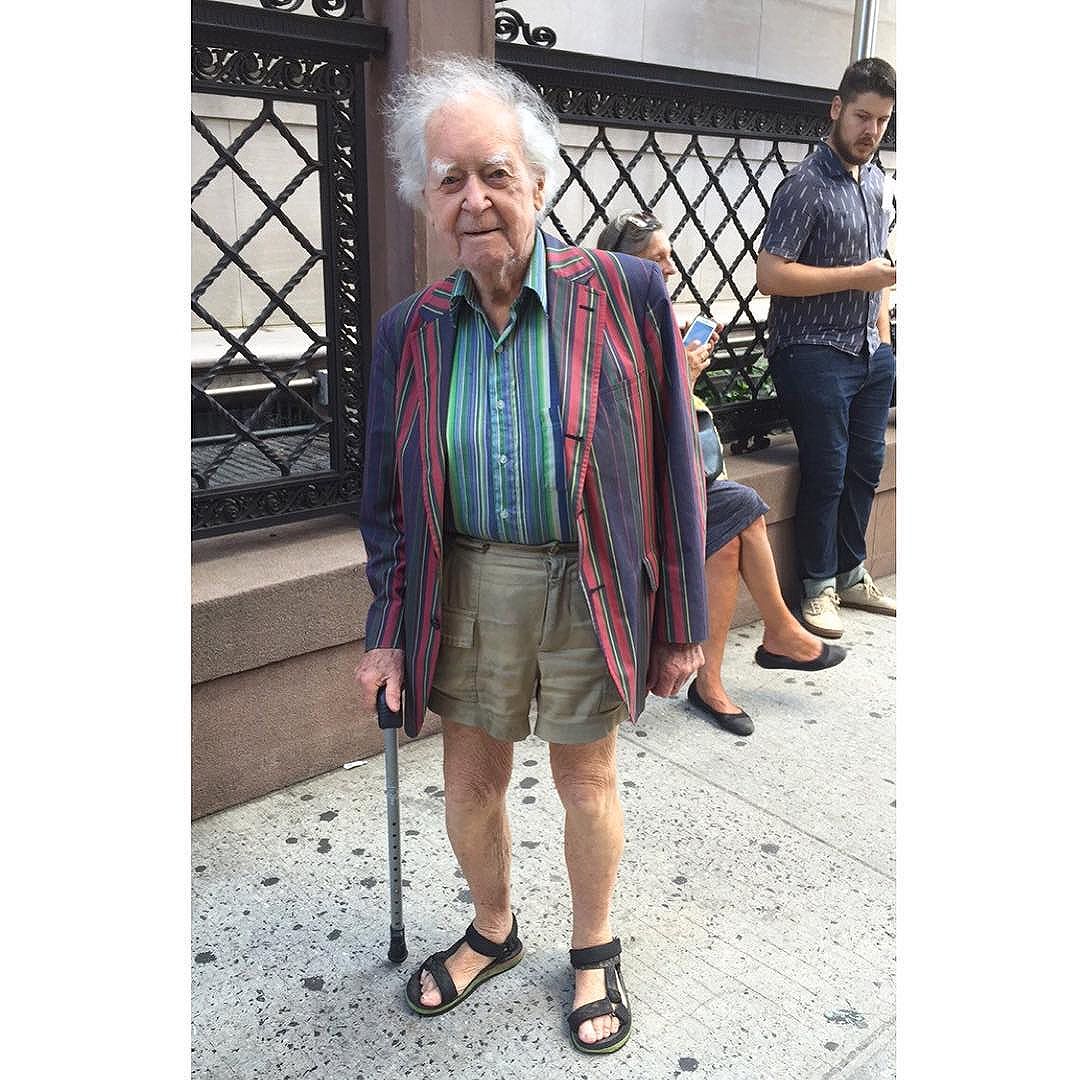 coolest dude I've seen during NYFW and I don't think he'll be beat. School boy striped blazer, striped shirt in contrasting colors, Maine shorts and sandals. Not a care in the world of what anyone thinks about his outfit when he passes the circus we call NYFW. Best look I've seen this summer for sure. yup, it's still summer. Wear those shorts but add a blazer, it's not that hot kids.