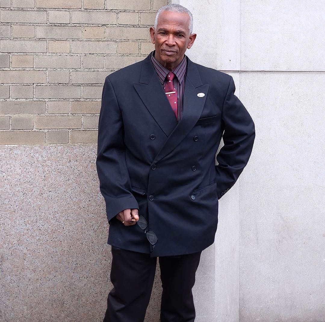 Security Guards are often my favorite people to shoot at fashion show venues. Look at his oversized Double Breasted Mixed-Matched Suit. Tie bar worn high! He was so sweet and asked me to send him a pic. Be nice these people will let you in anywhere. If you're nice.