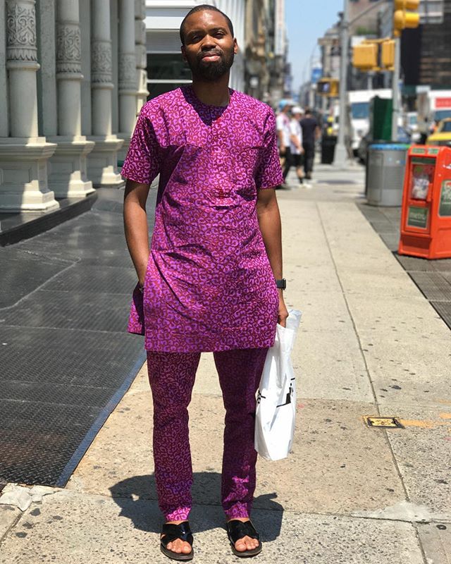 I love a suit in the summertime. He was visiting from Nigeria.
