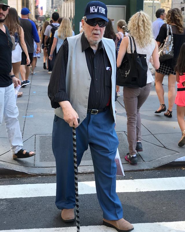 an open vest on a man that's been around is such a good look. just like hats, wear it and don't let it wear you and you're set. confidence kids, confidence. it's when it's buttoned and forced that it starts liking cutesy. no tie, relaxed a f