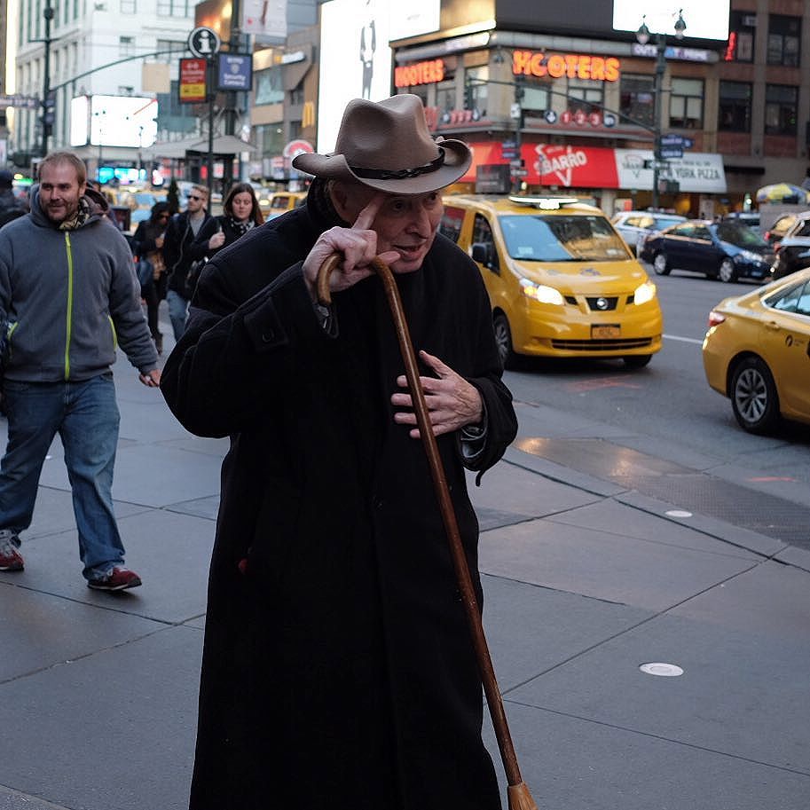 It must take hours at the kettle or hours of straight fiddling with that there brim to curl it like so. Something tells me he didn’t go to a local haberdashery and have it steamed like that. I really love what he’s done to his fedora to give it a sort of cowboy look.